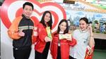 ภาพพนักงานจำนวน 4 คน ของวอลล์ และ ซีพี ออลล์ แสดงรอยยิ้ม
